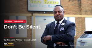 Rev. Aaron Phillips outside Sure House Baptist Church, Cleveland