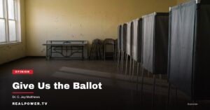 A row of empty voting booths in a neighborhood polling place before it opens.