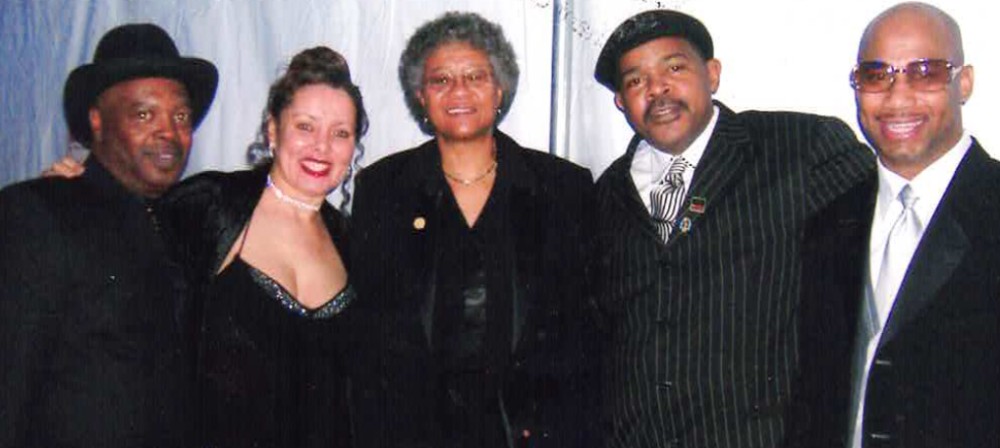 Five members of Kenn Dowell's original Cleveland campaign crew at an evening event.