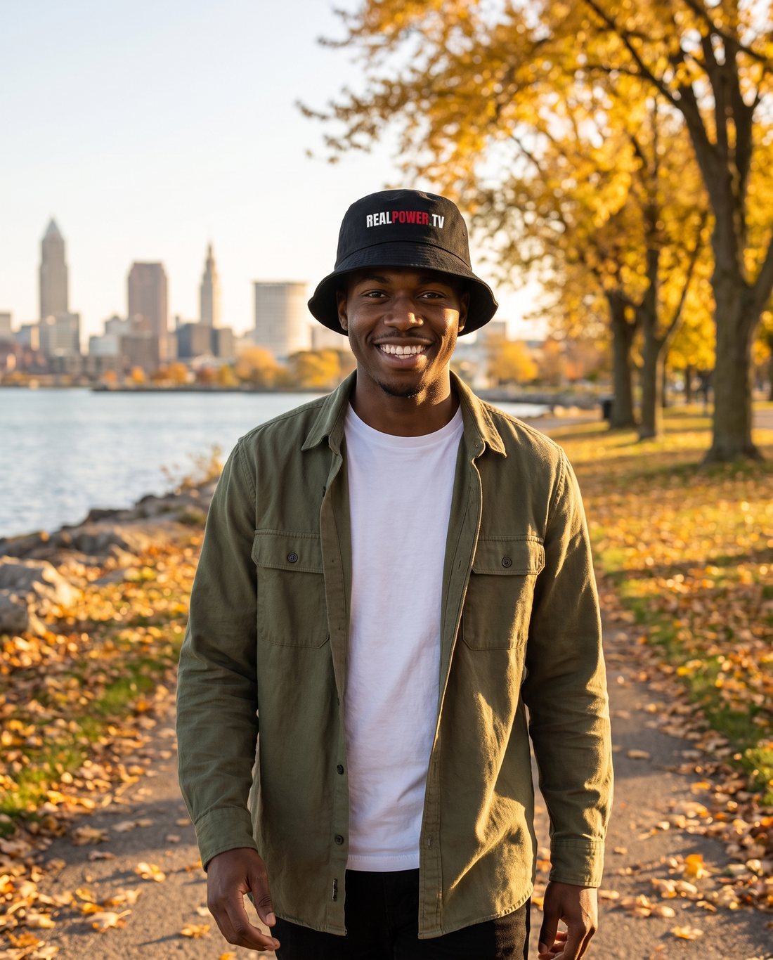 Model in the black RealPower.TV bucket hat on the Cleveland lakefront