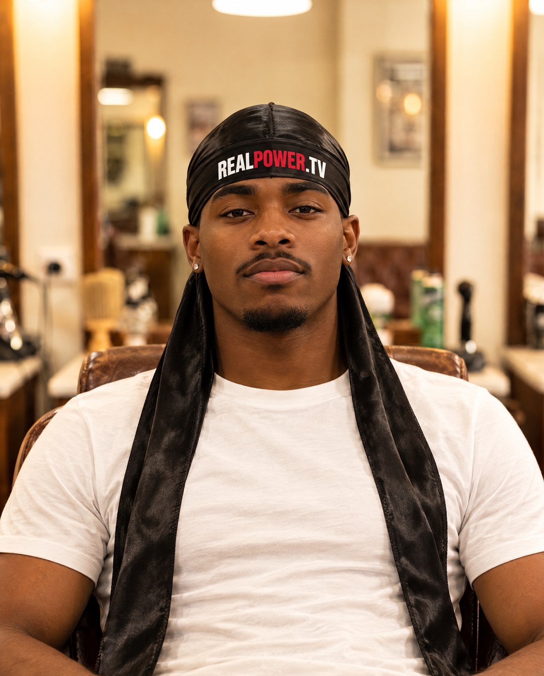 Model in the black Stay Ready durag, print across the back
