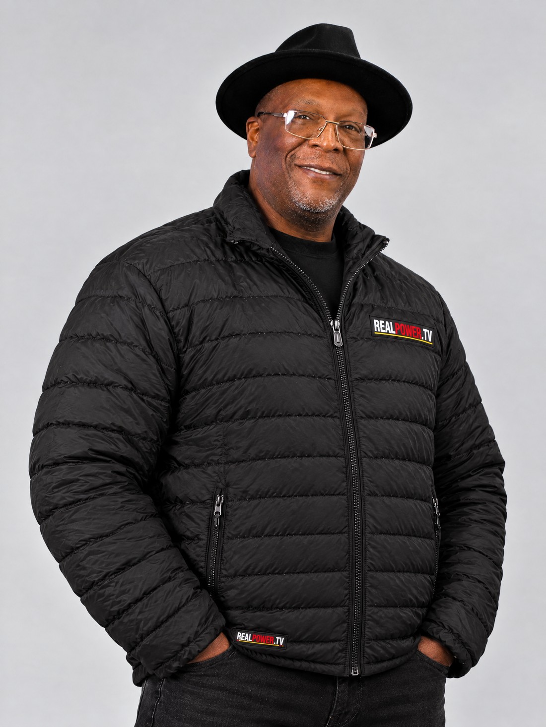 Kenn Dowell wearing The Authority Puffer Jacket