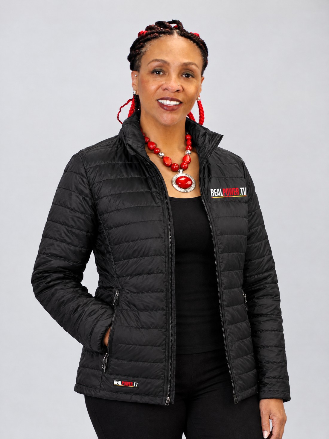 Dr. Heather E. Burton wearing The Authority Puffer Jacket